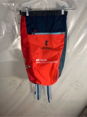 Cotopaxi Luzon 18L  backpack in Red and Navy Athletic Drawcord